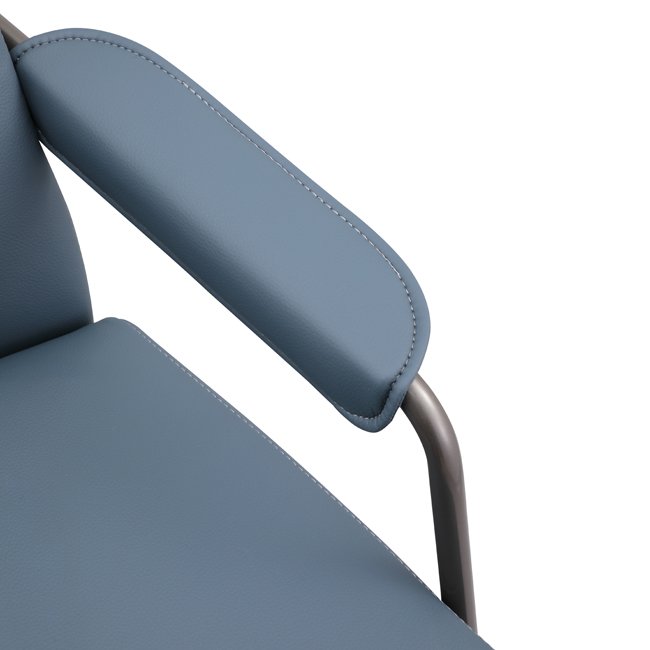 Contemporary lounge chair with soft blue upholstery, cushioned armrests, and curved black metal frame – designed for comfort in upscale hospitality or commercial spaces